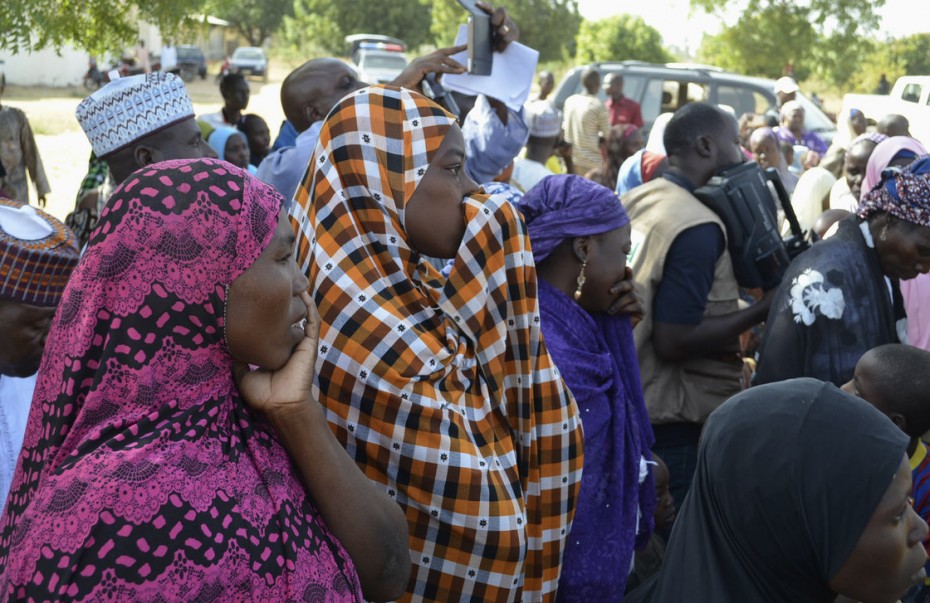 Photo: Reuters. Families of kidnapped schoolgirls attend a meeting with the local government in the remote town of Chibok, Nigeria. 