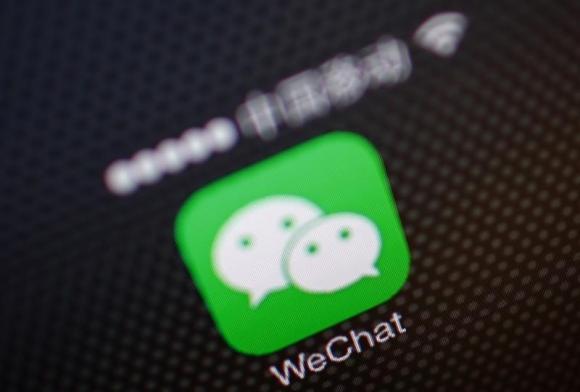 A picture illustration shows a WeChat app icon in Beijing. [REUTERS/Petar Kujundzic]