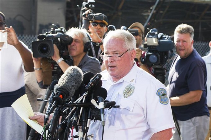 Ferguson Police Chief Thomas Jackson announcing the name of the officer. [REUTERS/Lucas Jackson]