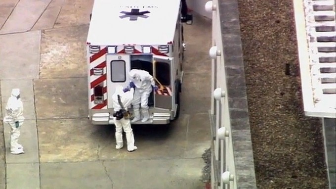 An ambulance arrives with an Ebola victim at Emory University Hospital in Atlanta on Saturday, Aug. 2, 2014. (WSB-TV Atlanta)