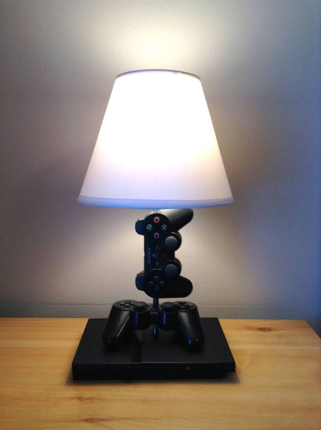 Lamps made from old game consoles, controllers and