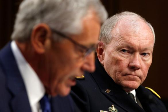 U.S. Secretary of Defense Chuck Hagel (L) and Chairman of the Joint Chiefs of Staff General Martin Dempsey testify during the Senate Armed Services Committee hearing on the U.S. policy toward Iraq and Syria and the threat posed by the Islamic State