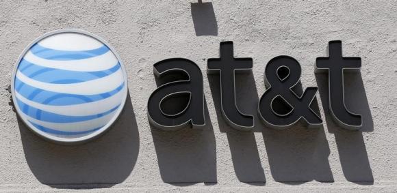 An AT&T logo is seen atop a store in Beverly Hills, California August 31, 2011. [REUTERS/Danny Moloshok]