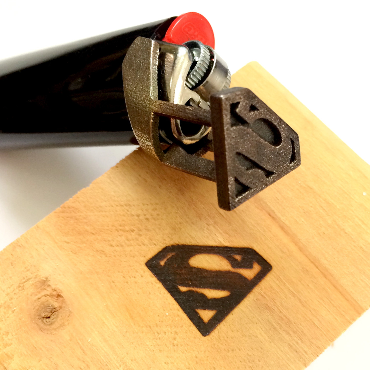 Superman branding iron / Boing Boing
