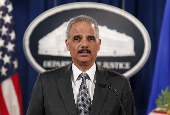 U.S. Attorney General Eric Holder makes a statement about the grand jury decision not to seek an indictment in the Staten Island death of Eric Garner during an arrest in July, in Washington December 3, 2014. [Reuters]