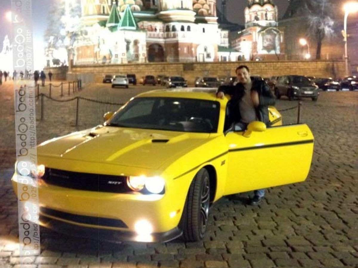 Roman Seleznev and his Dodge Challenger SR in front of the Kremlin in Moscow. The photo was found on his mobile phone.