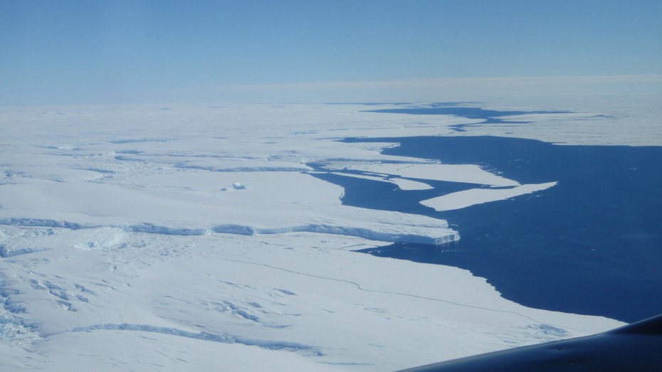 Aerial photo of Totten Glacier’s ice shelf edge taken during one of the team’s geophysical survey flights. Image: Jamin Greenbaum, U. Texas 