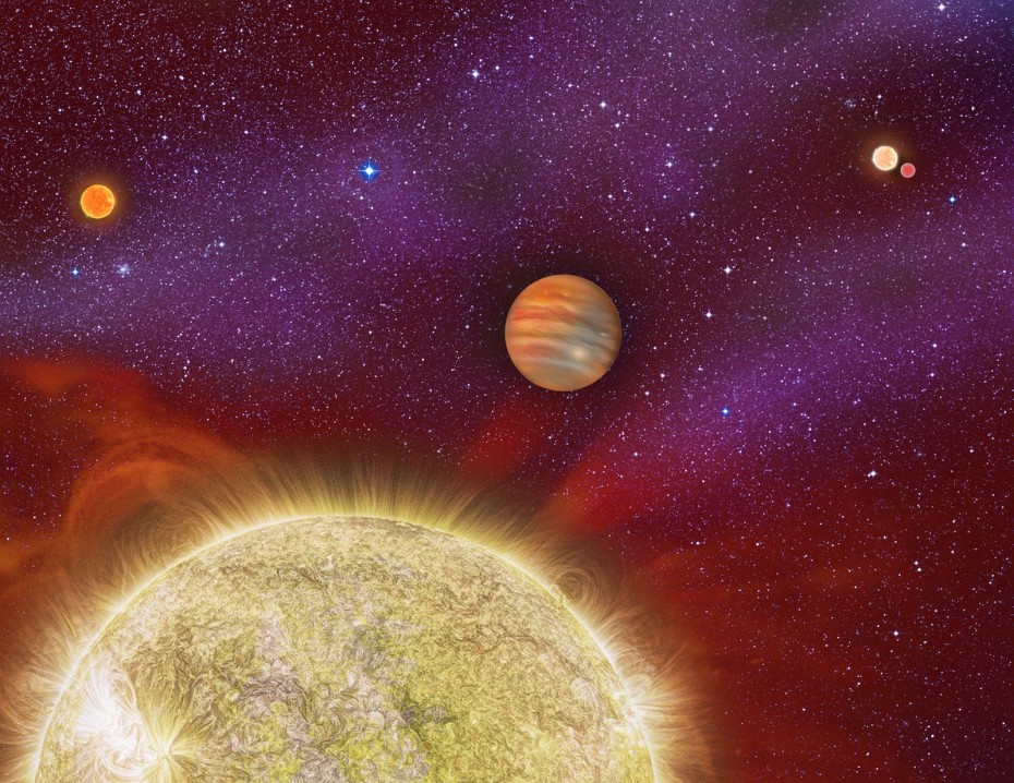 Planet With Four Stars: This artist's conception shows the 30 Ari system, which includes four stars and a planet. The planet, a gas giant, orbits its primary star (yellow) in about a year's time. The primary star, called 30 Ari B, has a companion -- the small