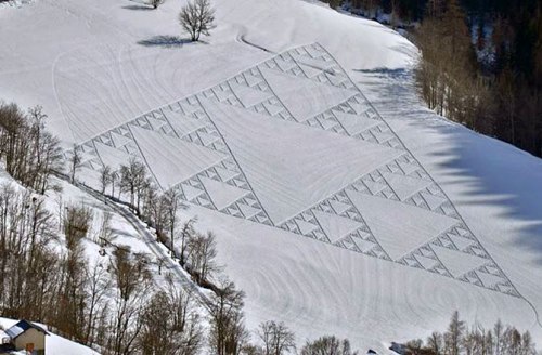 Sierpinski Triangle in snow by Simon Beck