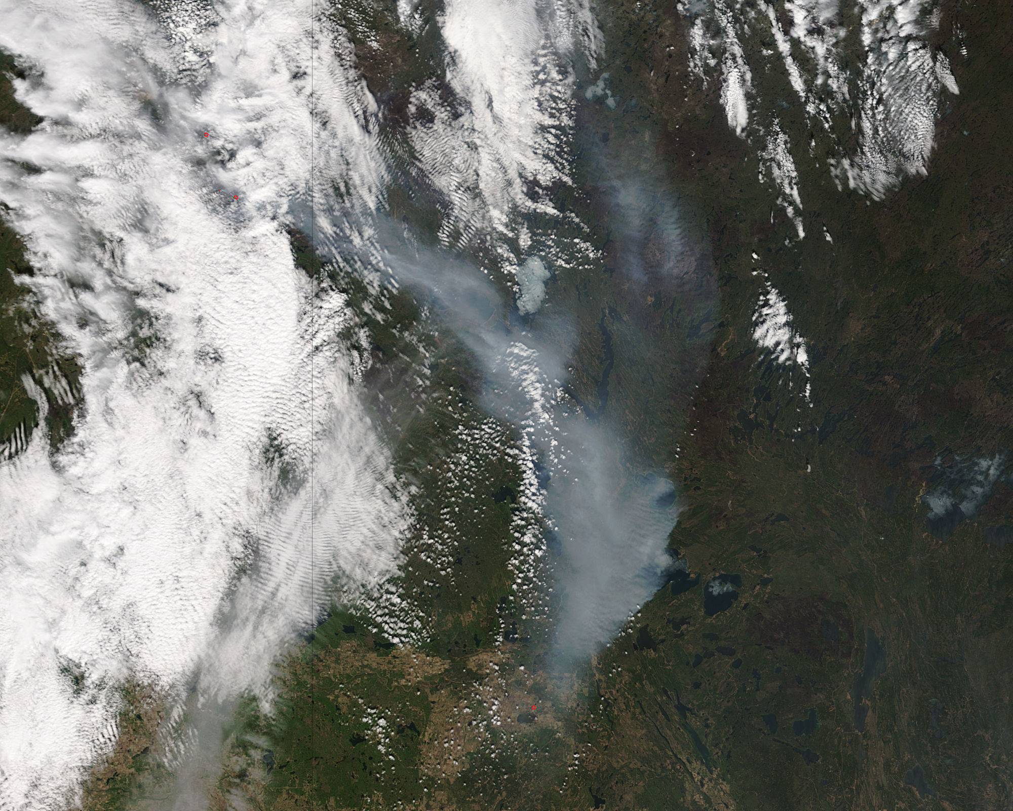 On May 8, 2016, the MODIS instrument on the Terra satellite captured this image of Ft. McMurray Fire in Alberta, Canada.<br />
[NASA Goddard MODIS Rapid Response Team]