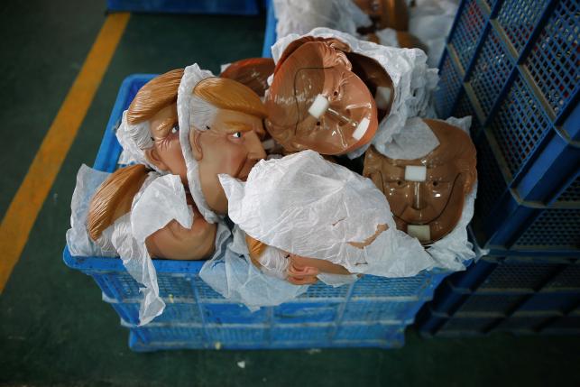 Masks of U.S. Republican presidential candidate Donald Trump lie in a box at Jinhua Partytime Latex Art and Crafts Factory in Jinhua, Zhejiang Province, China, May 25, 2016.  REUTERS/Aly Song