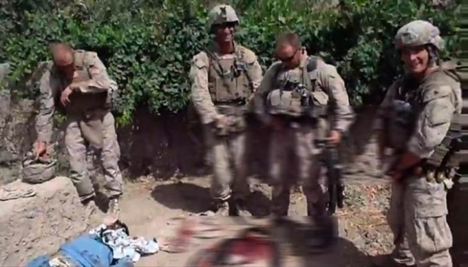 A still from a 2011 video posted online that showed Marines urinating on dead bodies. [Reuters]