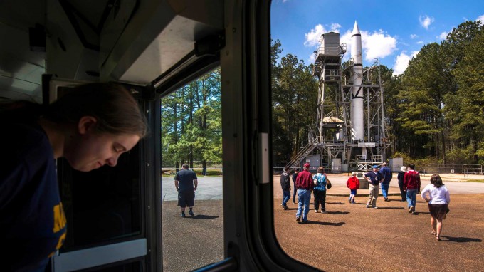 Visitors on a bus tour from the U.S. Space & Rocket Center make a stop at the historic Redstone test site, a National Historic Landmark at the NASA Marshall Space Flight Center, on Wednesday, April 9, 2014, in Huntsville, Ala.( Smiley N. Pool / Houston Chronicle )
