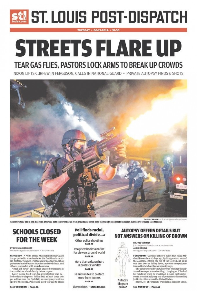 Holy crap, the front page of the St. Louis Post-Dispatch looks like a scene from Robocop / Boing ...