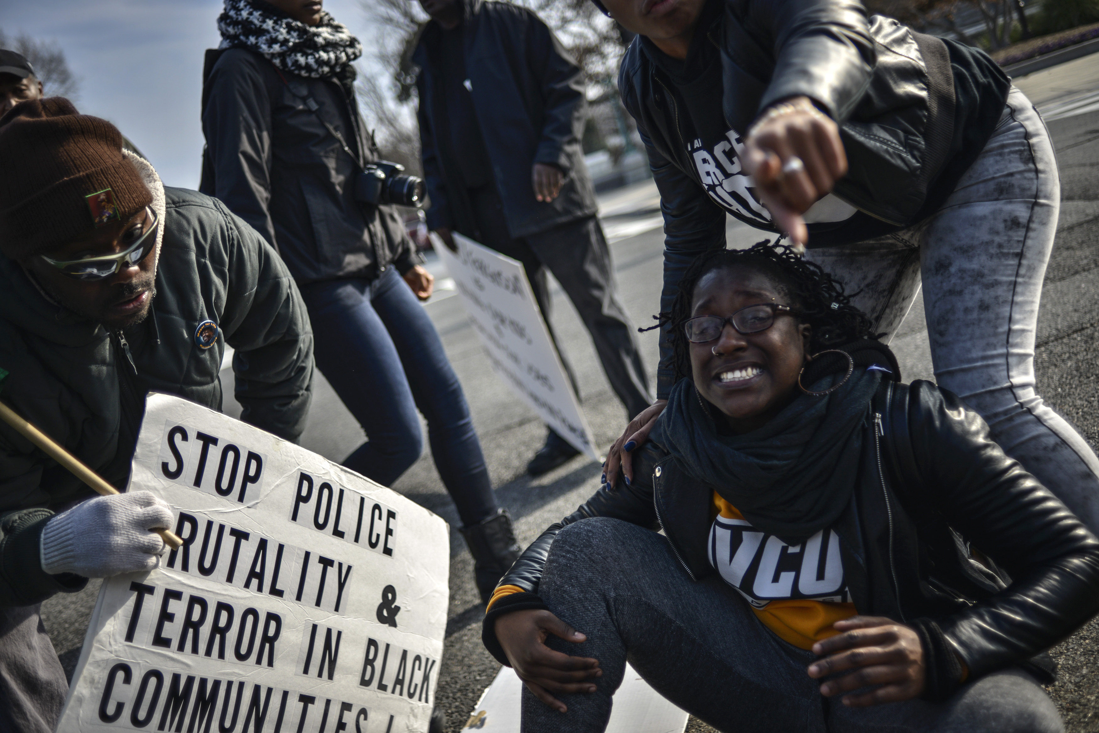 Demonstrators argue with US Capitol police as they march to join a