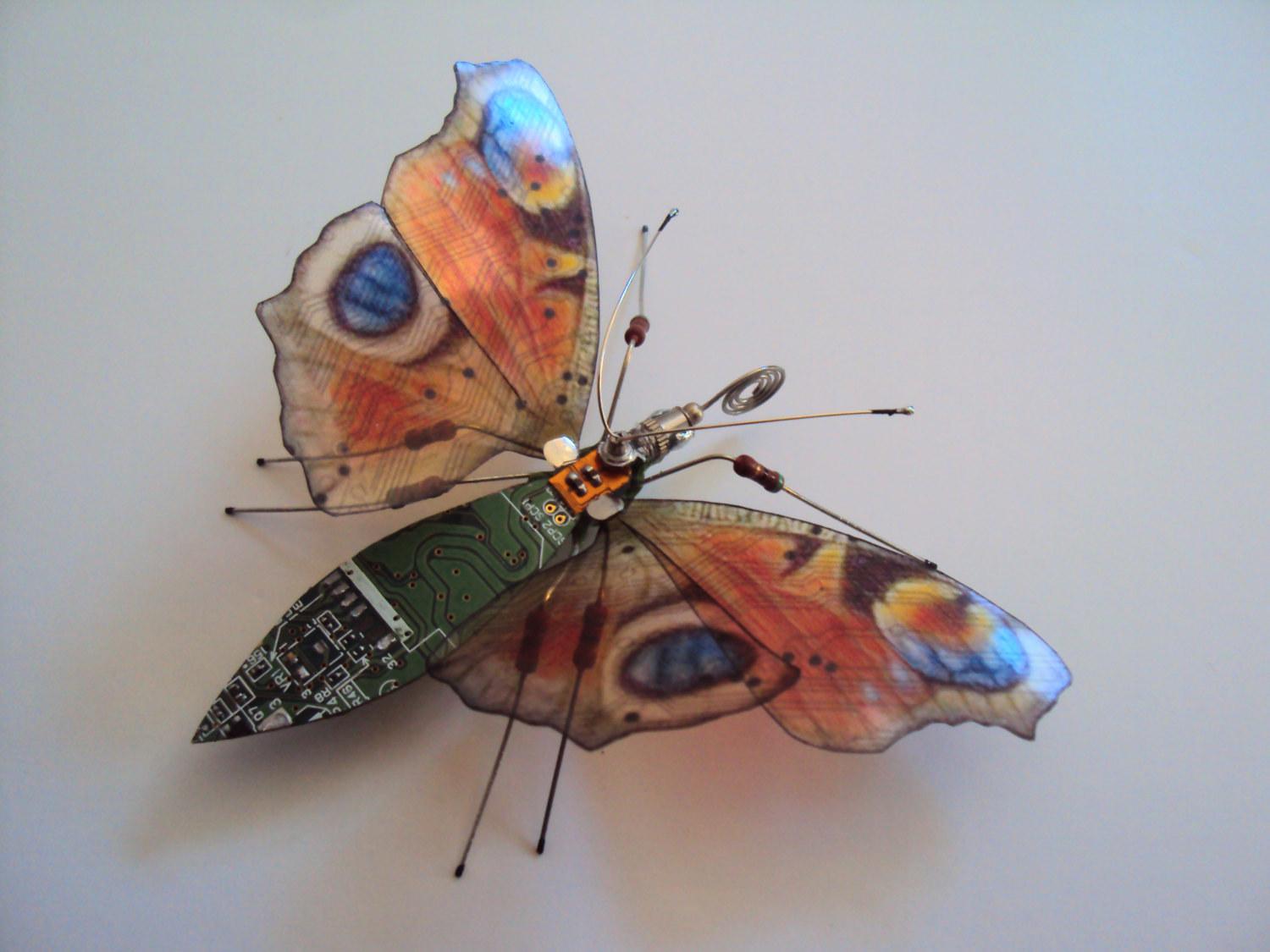 Iridescent insect sculptures from ewaste - Boing Boing