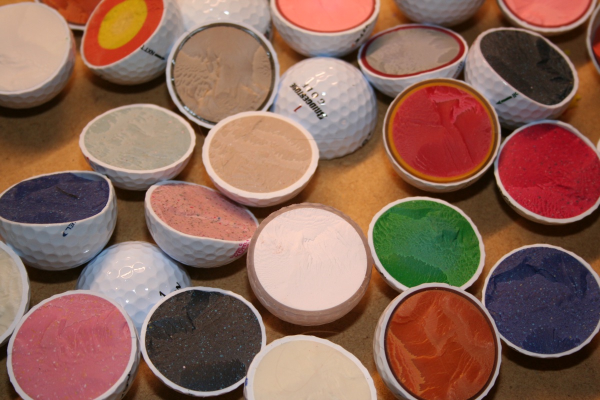 What's inside golf balls? Watch this guy slice open 10 of them, and ...