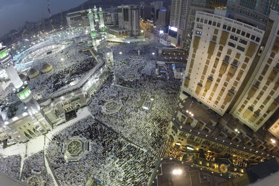 Muslim pilgrims pray around the holy Kaaba at the Grand Mosque