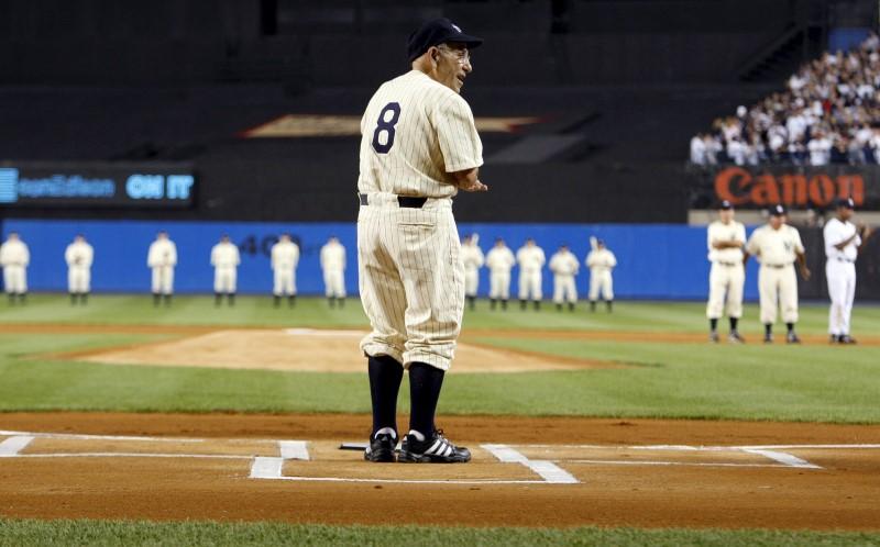 Yogi Berra stands at home plate, 2008. REUTERS