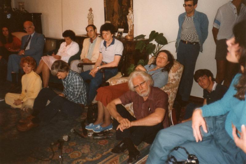 Ann and Sasha Shulgin surrounded by speakers and attendees.