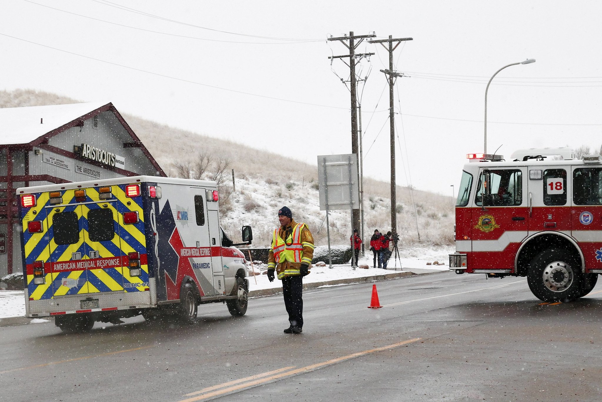An ambulance en route to a Planned Parenthood clinic in Colorado Springs on Friday. [Reuters]