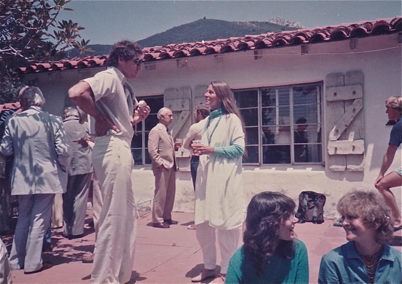 Patio scene with Carl Ruck and Joan Halifax in foreground. Albert Hofmann in the background.