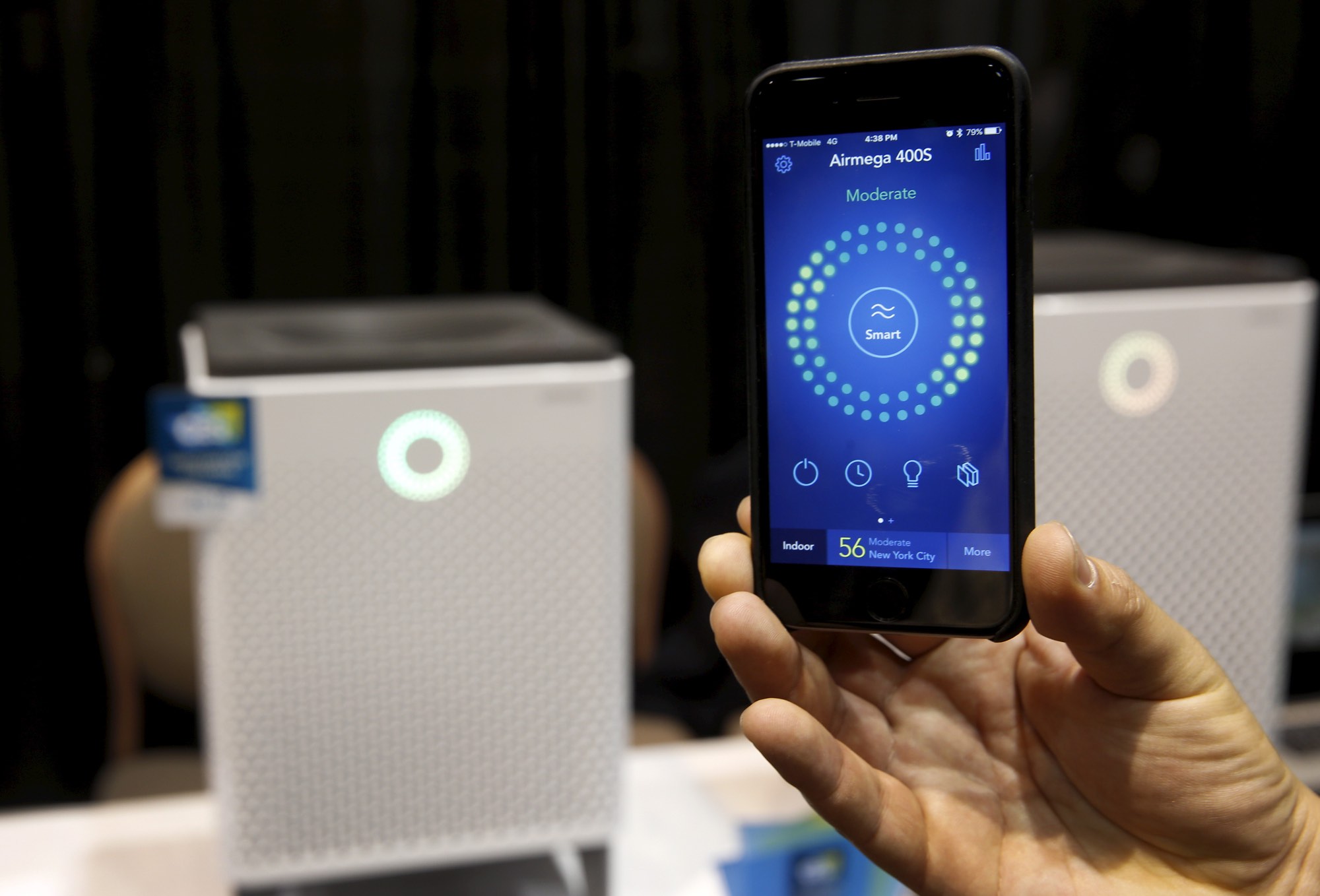 A smartphone receives real-time information on air quality from an Airmega air purifier from Coway. The WiFi-enabled, smart air purifiers from South Korea range in price from $749.00-$849.00 depending on the size. REUTERS