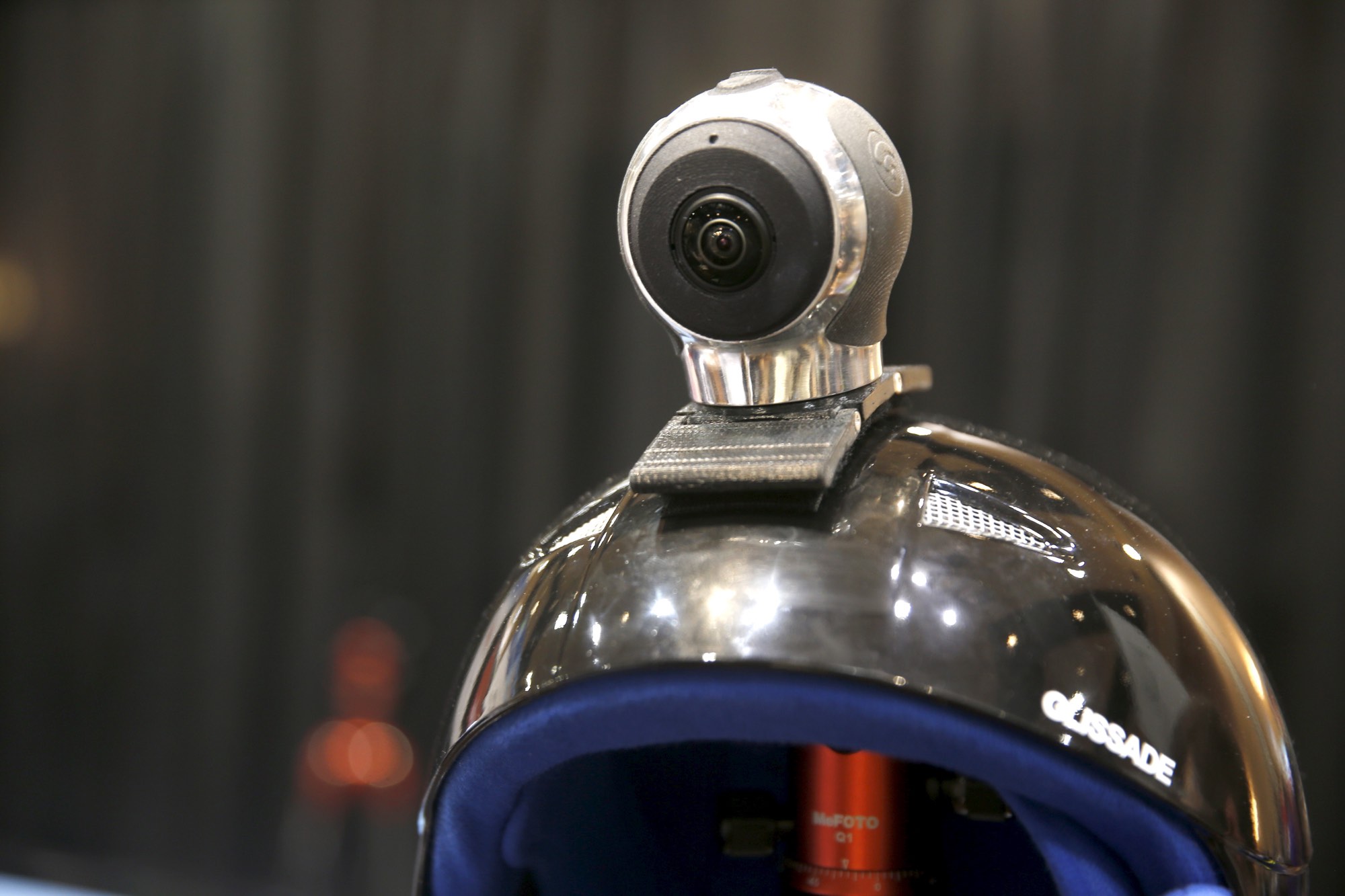 An Allie Go, a 360-degree action cam, by IC Real Tech is shown on a helmet. The $599.00 camera uses two sensors with over 180 degree-coverage each and combines the video in the unit using Qualcomm processors.  REUTERS