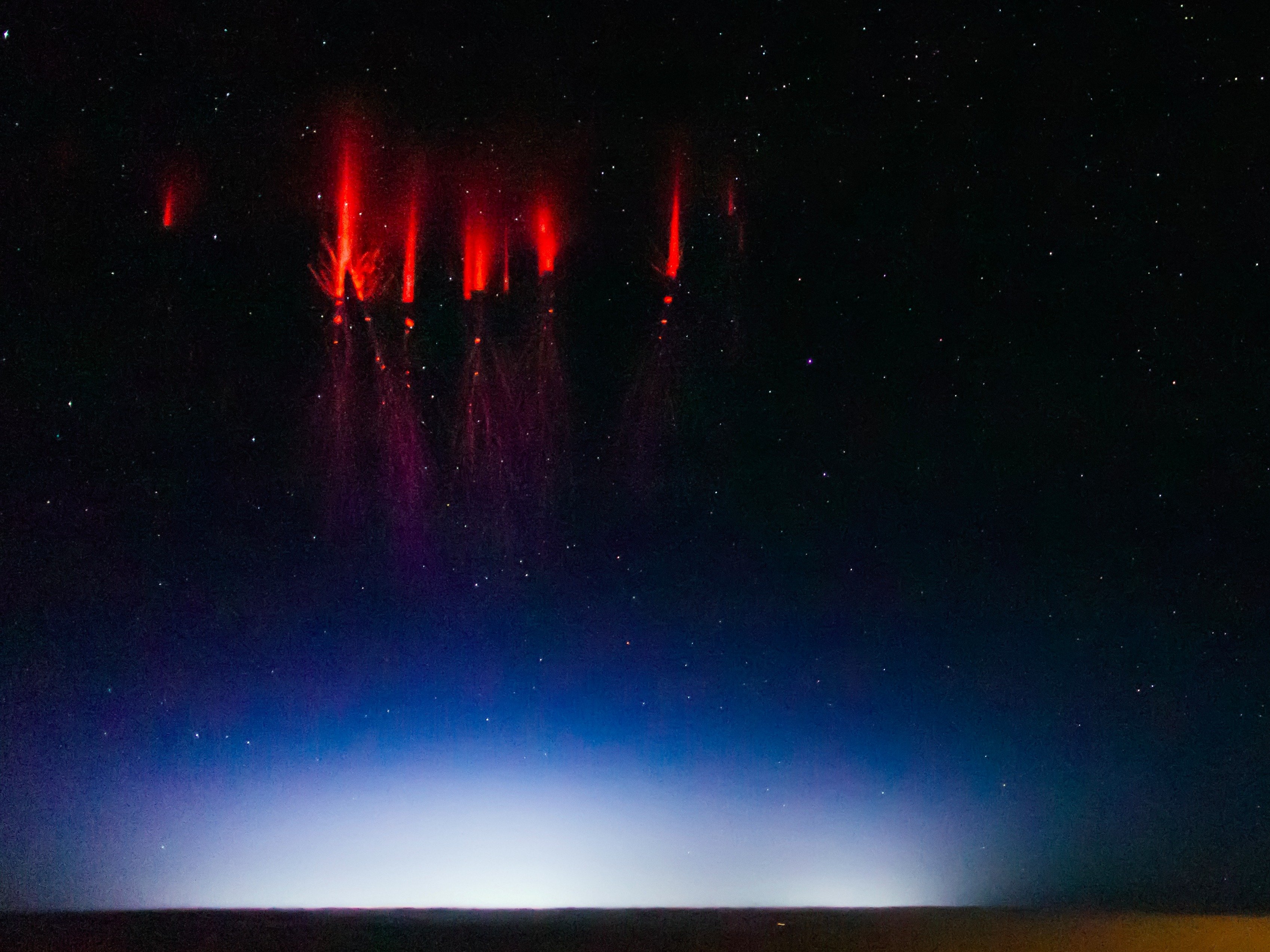 Rare red sprites dancing in the skies, above thunderstorms / Boing Boing