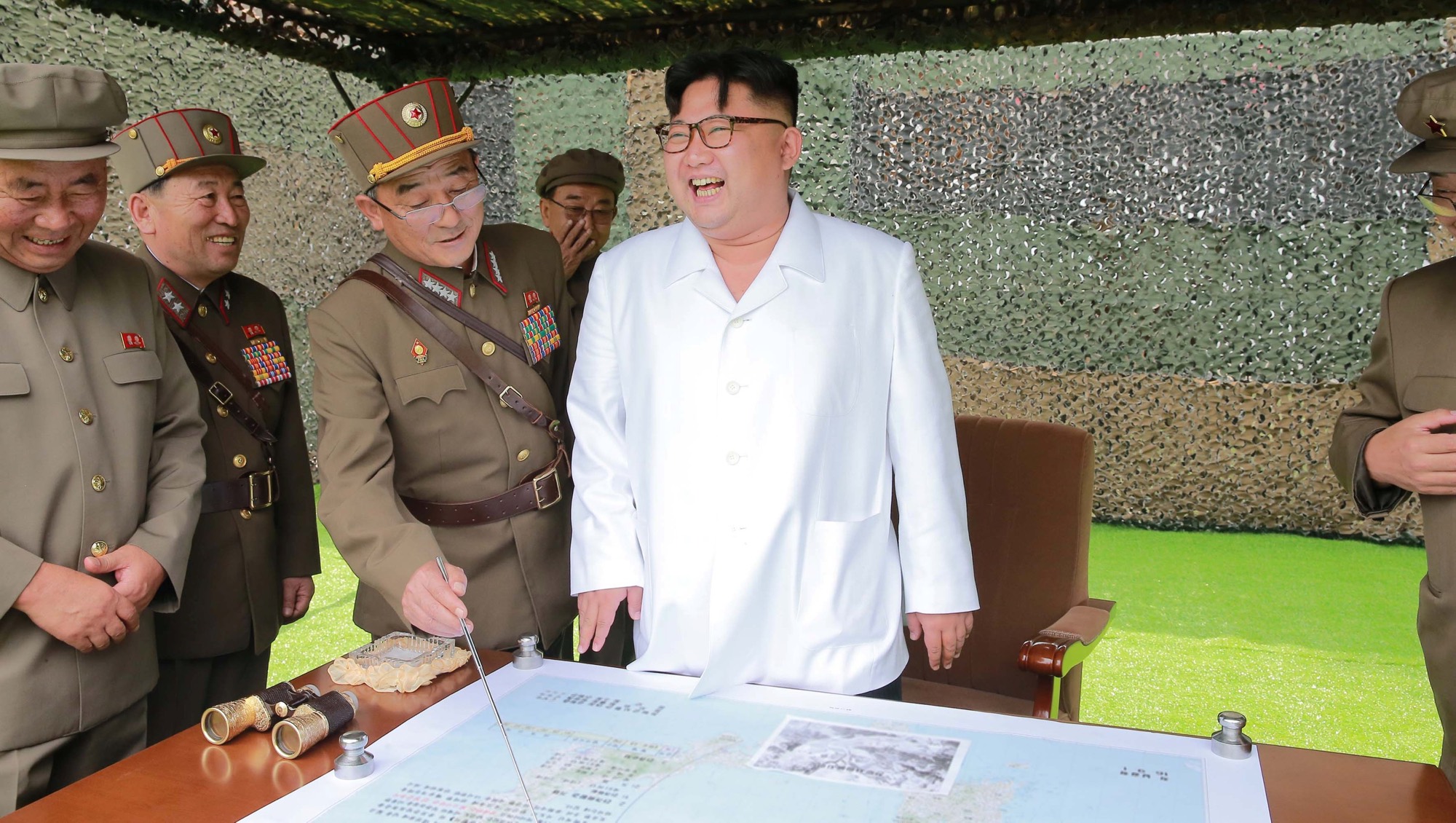 North Korean leader Kim Jong Un provides field guidance during a fire drill of ballistic rockets by Hwasong artillery units of the KPA Strategic Force, in  undated KCNA photo released Sep. 6, 2016.