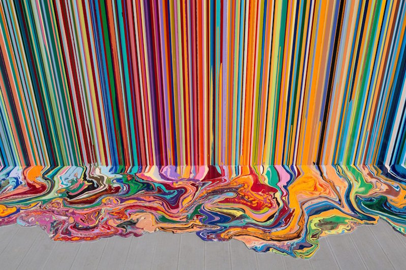 Interesting and colorful paintings made with controlled pours