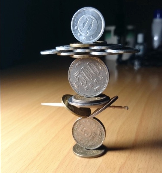 Marvel at this master of coin stacking
