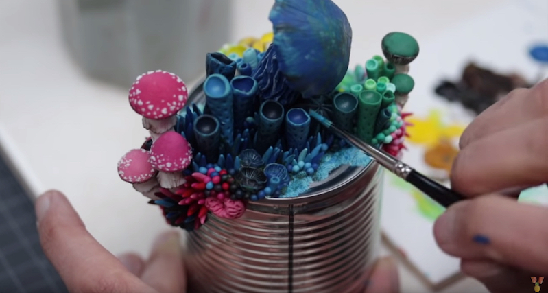 Artist adorns trash with vibrant sculptures resembling