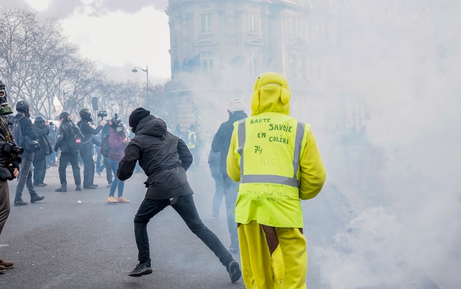 Paris Police Fire Tear Gas Water Cannons On Yellow Vest